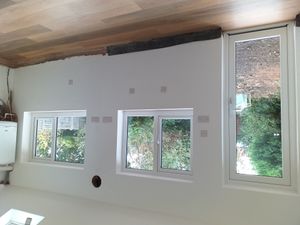 Original kitchen knocked through into old utility room