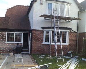 Installation of new windows to front of property and pointing of brickwork to match existing