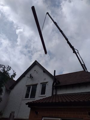 Delivery of 6M steel beam to support existing brickwork above