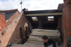 Rear roof slope removed prior to construction of dormer